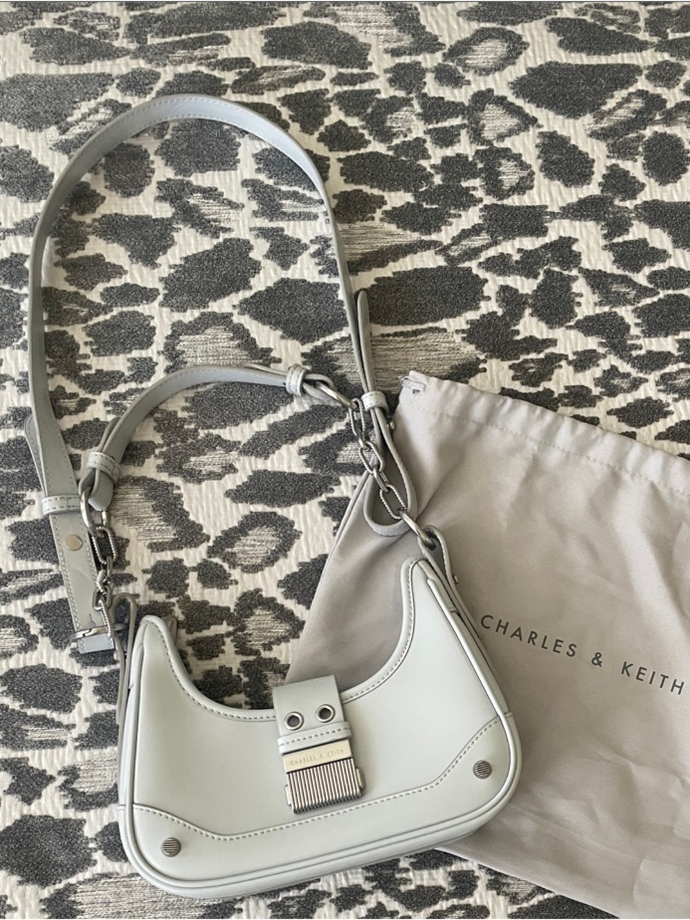 Charles & Keith Pale Gray Curved Leather Shoulder Bag | Winslet